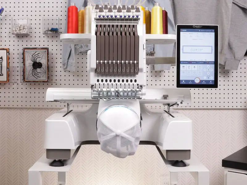 Ricoma Creator EM-10 ten-needle embroidery machine embroidering a cap